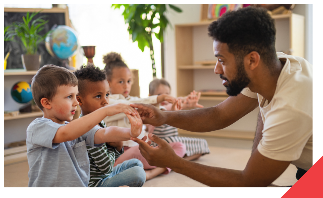 man at daycare with kids