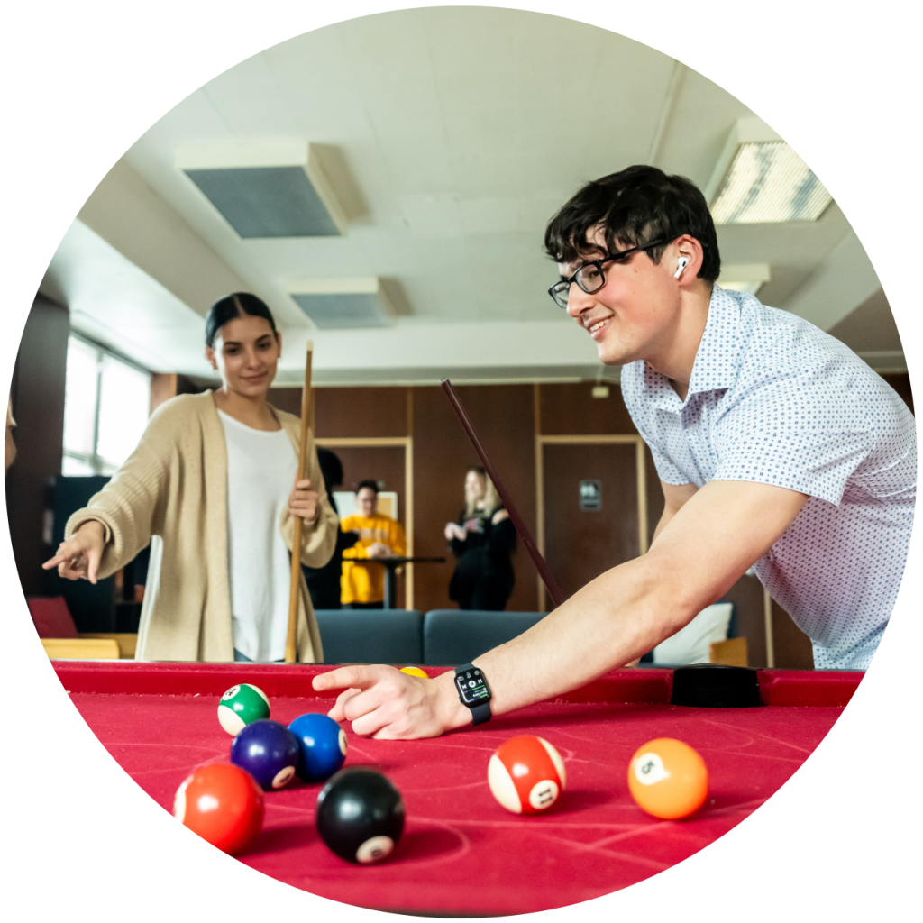 Students playing pool